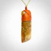 This is a beautiful hand carved Agate toki pendant. Provided with an adjustable cord and packaged in a woven kete pouch.